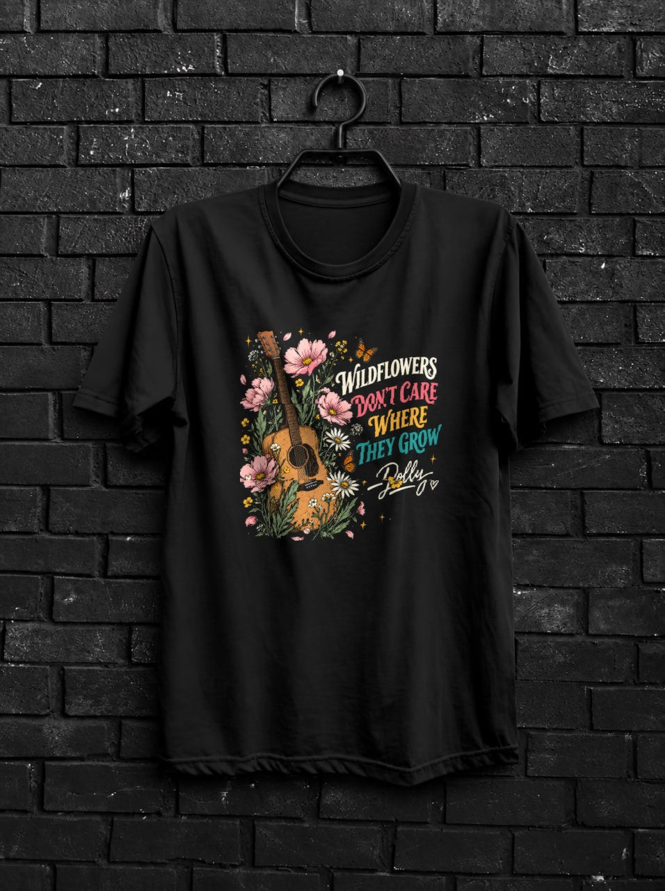 Wildflowers Dont Care Where They Grow Shirt — Black Shirt